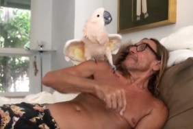 Iggy Pop with his cockatoo, Biggy