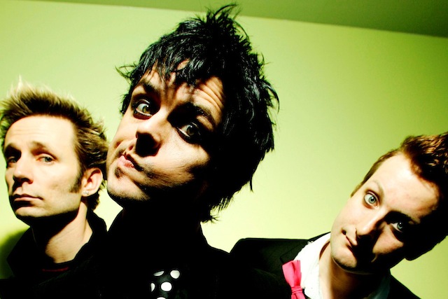 UNITED KINGDOM - JANUARY 01:  Photo of Billie Joe ARMSTRONG and GREEN DAY and Tre COOL and Mike DIRNT; L-R. Mike Dirnt, Billie Joe Armstrong, Tre Cool  (Photo by Nigel Crane/Redferns)